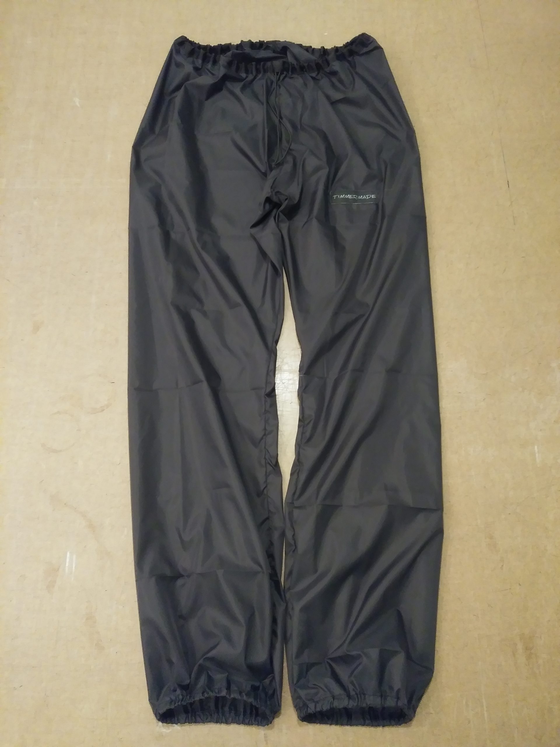 Under Armour Mens Small Wind Pants Black Loose Fit Ankle Zip Drawstring